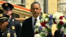 Obama pays respects
