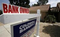 Reuters - A bank owned home is advertised for sale in Encinitas, California August 18, 2009. REUTERS/Mike Blake ...