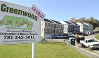 AP - In this photo made Oct. 26, 2009, a new development of townhouses is seen in Wakefield, Mass. Sales ...