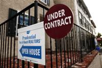 AP - In this Wednesday, Oct. 21, 2009 photo a sign for a home under contract is seen in Philadelphia. ...