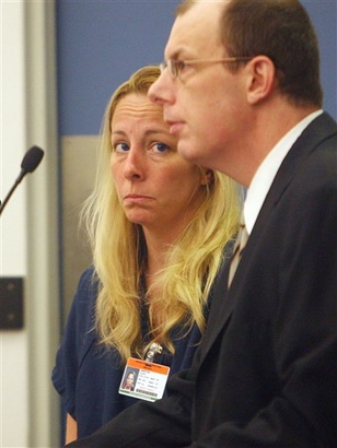 In this file photo, Bonnie Sweeten, left, who claimed she and her daughter had been kidnapped but instead turned up at Walt Disney World, makes her initial court appearance, May 29, 2009 at the Orange County jail in Orlando, Fla. (AP Photo/Red Huber, Pool)