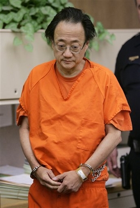 In this file photo, Norman Hsu is escorted into a Redwood City, Calif., courtroom, Sept. 21, 2007.  (AP Photo/Paul Sakuma, pool)