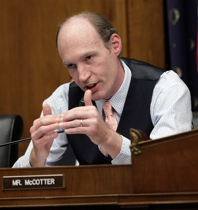 Rep. Thaddeus McCotter, R-Mich., questions AIG Chairman Edward Liddy during a hearing before the House Financial Services Subcommittee on Capitol Markets, Insurance and Government Sponsored Enterprises on Capitol Hill in Washington, March 18, 2009. (AP Photo/J. Scott Applewhite)