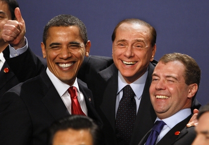 SAY CHEESE ??? President Barack Obama, left, poses for a group photo with Italian Prime Minister Silvio Berlusconi, center, and Russian President Dmitry Medvedev at the G20 Summit in London, April 2, 2009. (AP Photo/Kirsty Wigglesworth)