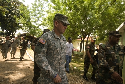 U.S. Army Brig. Gen. Ken Keen  of the Southern Command, center, walks in Dajabon during a tour to the border between Haiti and Dominican Republic, Friday, April. 13, 2007. (AP Photo/Ramon Espinosa)