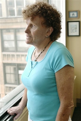 In this file photo, Rhiannon O'Donnabhain poses in her lawyer's office in Boston, July 12, 2007. For 57 years O'Donnabhain lived as a father, a husband, a sailor and a construction worker. Now O'Donnabhain is suing the IRS over denial of tax deduction for a sex-change operation. (AP Photo/Josh Reynolds)