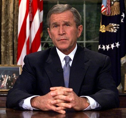 President Bush addresses the nation Tuesday, Sept. 11, 2001, from the Oval Office of the White House in Washington, about the terrorist attacks at the World Trade Center and the Pentagon. Bush said 'Freedom itself has been attacked this morning by a faceless coward.'  (AP Photo/Doug Mills)