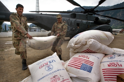 World Food Program wheat is unloaded from a  U.S Navy MH-53E helicopter during a rescue and aid mission by the U.S Marine Expeditionary Unit (MEU) August 17, 2010 in  Khawazakhela , Upper Swat, Pakistan. The U.S. military has been taking part in the recovery efforts during the devastating Pakistan floods since August 4, that has carried 215 metric tons of relief supplies from the World Food Program (WFP) to the Swat region, a region that has been cut off when bridges were washed away during flash flooding. According to the U.S.  military, they have evacuated 3,571 people from Kalam in Upper Swat. The country's agricultural heartland has been devastated, with rice, corn and wheat crops destroyed by floods. Officials say as many as 20 million people have been effected during Pakistan's worst flooding in 80 years. The army and aid organizations are struggling to cope with the scope of the wide spread scale of the disaster that has killed over 1,600 people and displaced millions. The UN has described the disaster as unprecedented, with over a third of the country under water.  (Photo by Paula Bronstein/Getty Images)