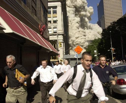 People run from the collapse of World Trade Center ...