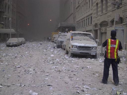 Ash covers a street in downtown New York City ...
