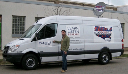 Mike Byhoff stands in front of the Ask America van.