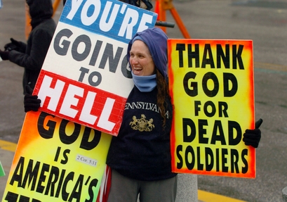 Shirley Phelps-Roper, a member of the Westboro Baptist Church of Topeka, Kan., protests in front of the Pennsylvania Statehouse Thursday, March 2, 2006, in Harrisburg, Pa. The group planned to picket a military funeral near Harrisburg later Thursday, saying that U.S. soldiers are dying overseas as a punishment from God because America tolerates homosexuals. (AP Photo/Bradley C. Bower)