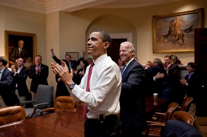 President Barack Obama, Vice President Joe Biden, and senior staff, react in the Roosevelt Room of the White House, as the House passes the health care reform bill, March 21, 2010. (Official White House Photo by Pete Souza)