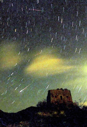 Colorful streaks of meteors are seen in the sky ...