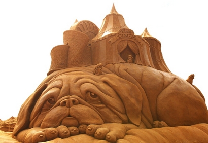 A sand sculpture entitled "Flea Circus" carved ...