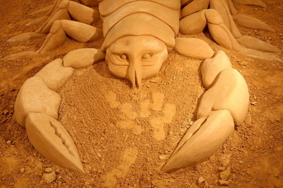 A sand sculpture entitled "Giant Scorpion" carved ...