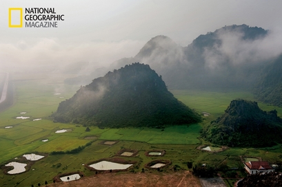 Mist sweeps past the hills of Phong Nha-Ke Bang ...