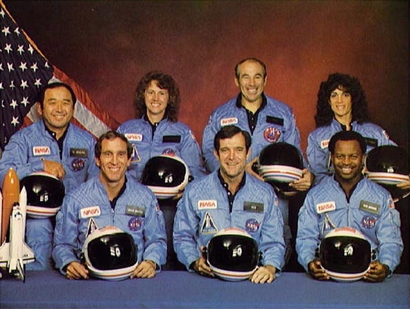 Space Shuttle Challenger crew members gather ...