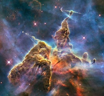 A mountain of dust and gas rising in the Carina ...