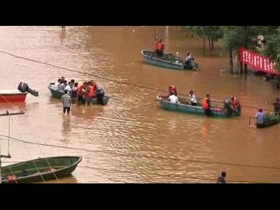 Chinese floods breach dyke again