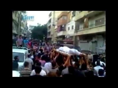 Helicopters, protests and funerals in Syria