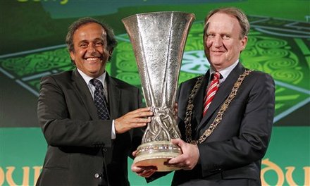 UEFA President Michel Platini, Left, Hands Over The UEFA Europa League Trophy To Gerry Breen, Lord Mayor Of Dublin City