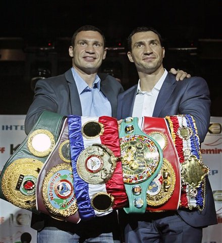 Ukrainian Brothers And Heavyweight World Boxing Champions  Wladimir , Right, And Vitali Klitschko Pose With Their Belts