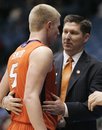 Clemson coach Brad Brownell congratulates guard Tanner Smith (5) as he is taken out in the second half of a first-round NCAA college basketball tournament game against UAB , Tuesday, March 15, 2011, in Dayton, Ohio . Smith scored 10 points as Clemson won 70-52.