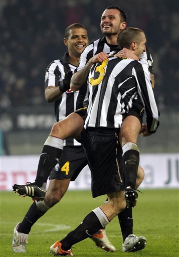 Juventus' Simone Pepe, Second From Right, Is Cheered By Teammates Giorgio Chiellini, Right, And Felipe Melo, Of Brazil,