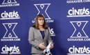Amy Waugh is introduced as the new head women's basketball coach at Xavier during a news conference, Wednesday, April 20, 2011 in Cincinnati. Waugh was an assistant to Kevin McGuff the last two seasons. McGuff left for Washington after Xavier was knocked out in the second round of the NCAA tournament.