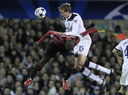 Tottenham Hotspur's Peter Crouch, Right, Competes