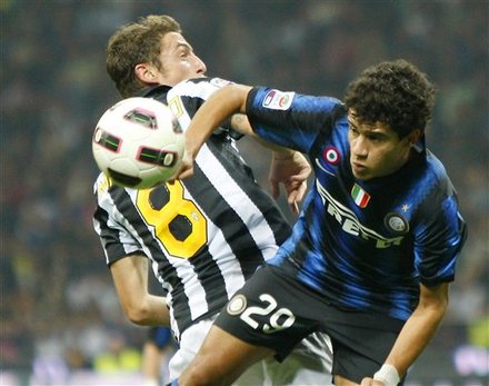 Inter Milan Brazilian Midfielder Coutinho, Right, Challenges For The Ball With Juventus Midfielder Claudio Marchisio