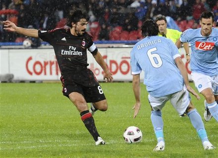 AC Milan's Gennaro Gattuso, Left, Vies