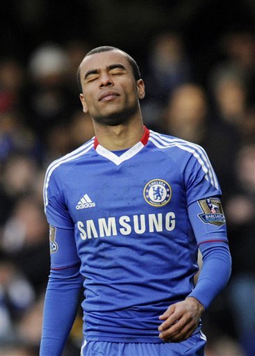 FILE - In this Saturday, Feb. 19, 2011 file photo Chelsea's Ashley Cole reacts after failing to score during a penalty shoot out against Everton during their fourth round English FA Cup replay soccer match at the Stamford Bridge stadium, London. Chelsea defender Ashley Cole accidentally shot a club intern with an air gun at the team's training ground, a British newspaper reported Sunday Feb. 27, 2011. (AP Photo/Tom Hevezi, File) NO INTERNET/MOBILE USAGE WITHOUT FOOTBALL ASSOCIATION PREMIER LEAGUE(FAPL)LICENCE. CALL +44 (0) 20 7864 9121 or EMAIL info@football-dataco.com FOR DETAILS