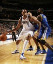 DALLAS - DECEMBER 7: Alexis Ajinca #8 of the Dallas Mavericks drives against Dorrell Wright #1 of the Golden State Warriors during a game on December 7, 2010 at the American Airlines Center in Dallas, Texas. (Photo by Danny Bollinger/NBAE via Getty Images)