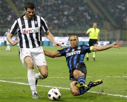 Juventus Forward Vincenzo Iaquinta, Left, Is