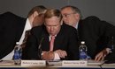 Dr. Robert Stern, right, and Chris Nowinski, left, confer before answering a reporter's question at the Boston University Center for the Study of Traumatic Encephalopathy news conference about the finding of Chronic Traumatic Encephalopathy in the brain of former NFL player Dave Duerson in Boston, Monday morning, May 2, 2011. Duerson committed suicide in February. Dr. Robert Cantu, MD, is at center.