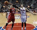 Atlanta Hawks guard Mike Bibby (10) shoots past the reach of Detroit Pistons forward Austin Daye (5) in the second half of an NBA basketball game in Auburn Hills, Mich., Monday, Feb. 14, 2011. Atlanta won 94-79.