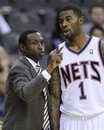 New Jersey Nets coach Avery Johnson talks with Terrence Williams (1) during the first quarter of a preseason NBA basketball game against the Boston Celtics Thursday, Oct. 7, 2010,  in Newark, N.J.