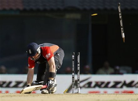 England's Ian Bell is bowled by West Indies' Kemar Roach during the Cricket World Cup match between England and West Indies in Chennai, India, Thursday, March 17, 2011.