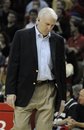 San Antonio Spurs coach Gregg Popovich stands on the sidelines during the final minutes of overtime in an NBA basketball game against the Houston Rockets Friday, April 1, 2011, in Houston. The Rockets won in overtime 119-114.