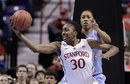 Stanford's Nnemkadi Ogwumike reaches for a pass in front of North Carolina 's Chay Shegog in the second half of an NCAA women's college basketball tournament regional semifinal, Saturday, March 26, 2011, in Spokane, Wash. Stanford won 72-65.