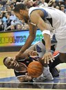 Minnesota Timberwolves ' Wayne Ellington , right, and Atlanta Hawks ' Jeff Teague battle for the loose ball in the second half of an NBA basketball game on Friday, Nov. 5, 2010, in Minneapolis. The Hawks won 113-103.