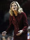 North Carolina State coach Kellie Harper reacts to an official's call during the first half of an NCAA college basketball game against Duke in Raleigh, N.C., Sunday, Jan. 23, 2011. Duke won 65-64.