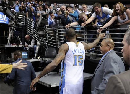 Denver Nuggets Forward Carmelo Anthony High-fives Fans