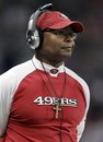 San Francisco 49ers head coach Mike Singletary looks on from the sidelines during the first quarter of an NFL football game against the St. Louis Rams , Sunday, Dec. 26, 2010, in St. Louis.