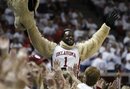 Oklahoma Sooners All American and current Tampa Bay Buccaneers player Gerald McCoy puts on a Boomer Mascot costume at the Baylor at Oklahoma NCAA college basketball game in Norman, Okla. on Sunday, Feb. 27, 2011.