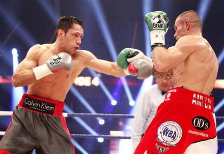 Germany's Felix Sturm, Left, And Britain's Martin Murray Fight Each Other