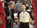 Philadelphia 76ers head coach Doug Collins, left, talks with official Pat Fraher about a foul call during the third quarter against the Sacramento Kings in a NBA basketball game in Sacramento,  Calif., Friday March 18, 2011.  The 76ers won 102-80. (AP Photo)