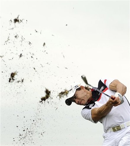 Camilo Villegas from Columbia hits out of the rough during the final round of the Australian Masters at Victoria Golf Club in Melbourne, Australia, Sunday, Nov.14, 2010. Villegas finished the tournament at 3-under par, with Australia's Stuart Appleby winning with 10 under.